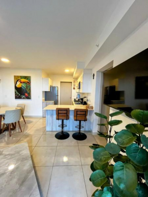 Top-floor overlooking uptown with AC & parking